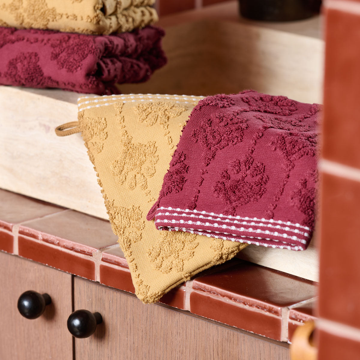 gant de toilette neroli, curry et prune